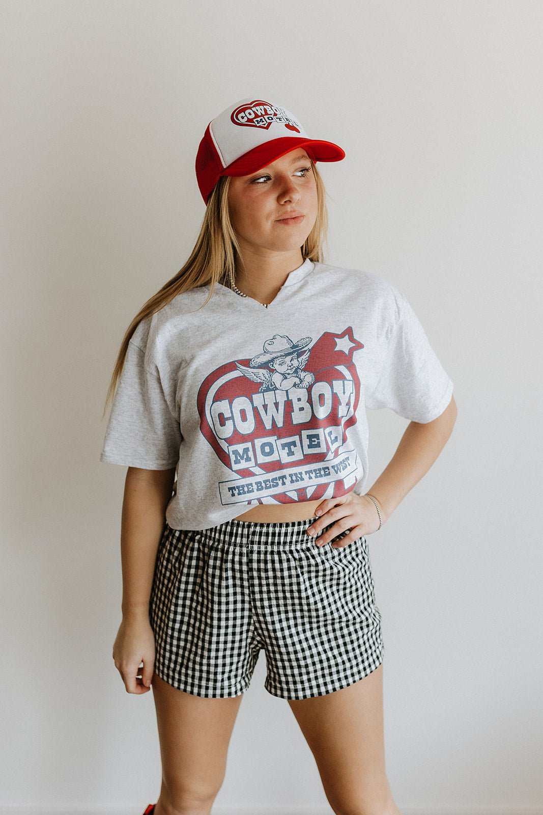 Cowboy Motel Raw Cut V - neck GraphicTeeAdd tee color hereS